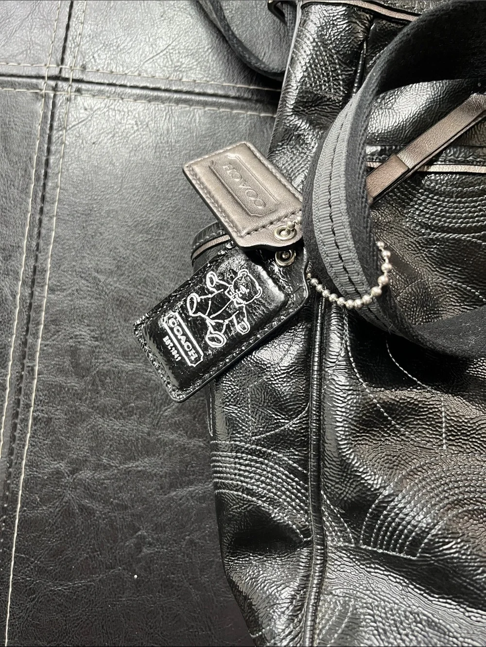 Coach Black Patent Leather Baby Bag with Signature Circular Stitching